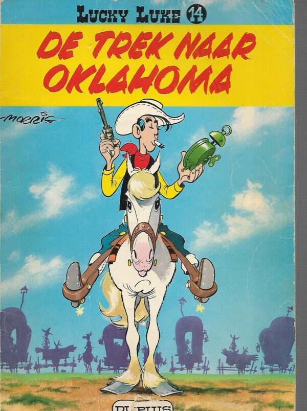 Lucky luke nr 17 in het spoor van de daltons Goede staat gebruikers sporen a Lucky luke... Dupuis nr 14 De trek naar oklahoma