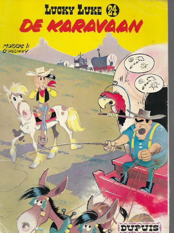 Lucky luke nr 24 De karavaan Goede staat iets gebruikers sporen a Lucky luke... Dupuis nr 24 De caravaan